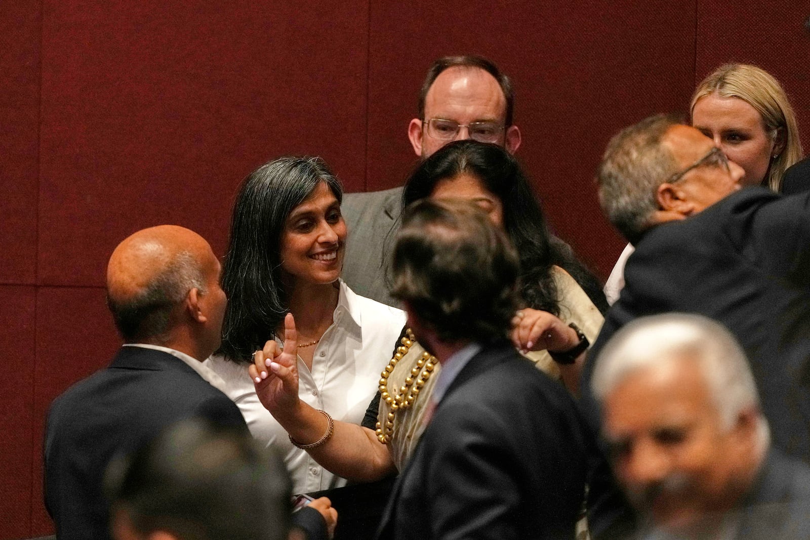 U.S. Vice President JD Vance's wife Usha Vance, second left, talks to invitees after a speech by her husband at the Rajasthan International Center in Jaipur, India, Tuesday, April 22, 2025. (AP Photo/Manish Swarup)