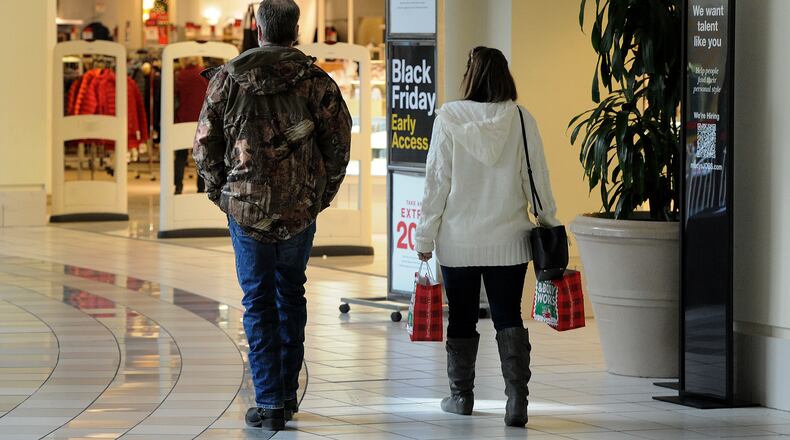 Shoppers looking for good deals at the Dayton Mall Monday, Nov. 22, 2021. MARSHALL GORBY\STAFF
