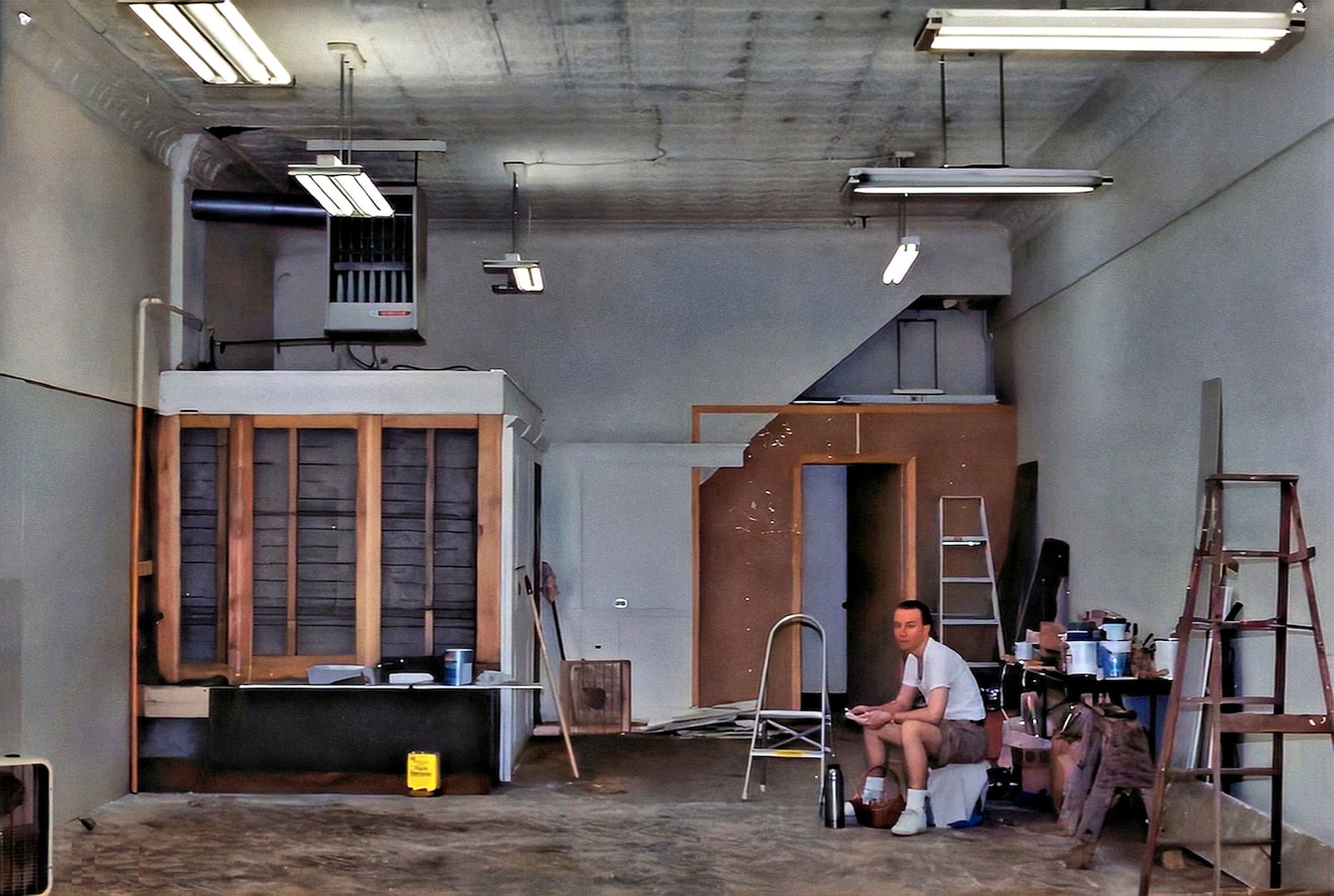 Davis Fair is shown during the renovation of his second and current business location at 301 Public Square SE in Troy. CONTRIBUTED