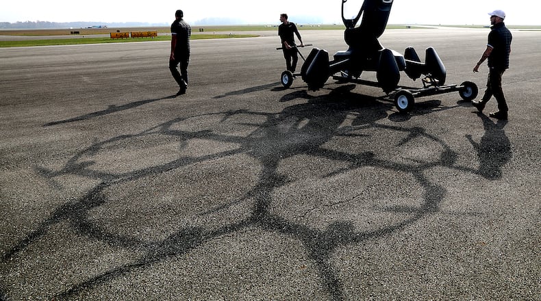 The Lift Aircraft crew prepares to demonstrate their advanced air mobility system, or flying car, during the Advanced Air Mobility Showcase at Springfield-Beckley Municipal Airport late last year. The event featured some of the top companies in the world of advanced air mobility systems as they showed their flying vehicles and the technology that makes them possible. BILL LACKEY/STAFF