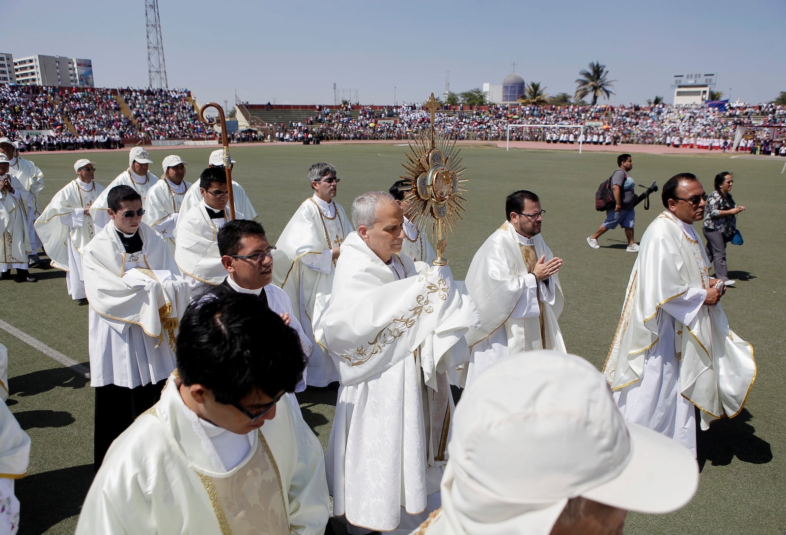FILE - Pope Leo XIV, then Apostolic Administrator of Chiclayo Robert Prevost, attends a Corpus Christi celebration at a stadium in Chiclayo, Peru, Friday, June 19, 2015. (AP Photo/Julio Reano, File)