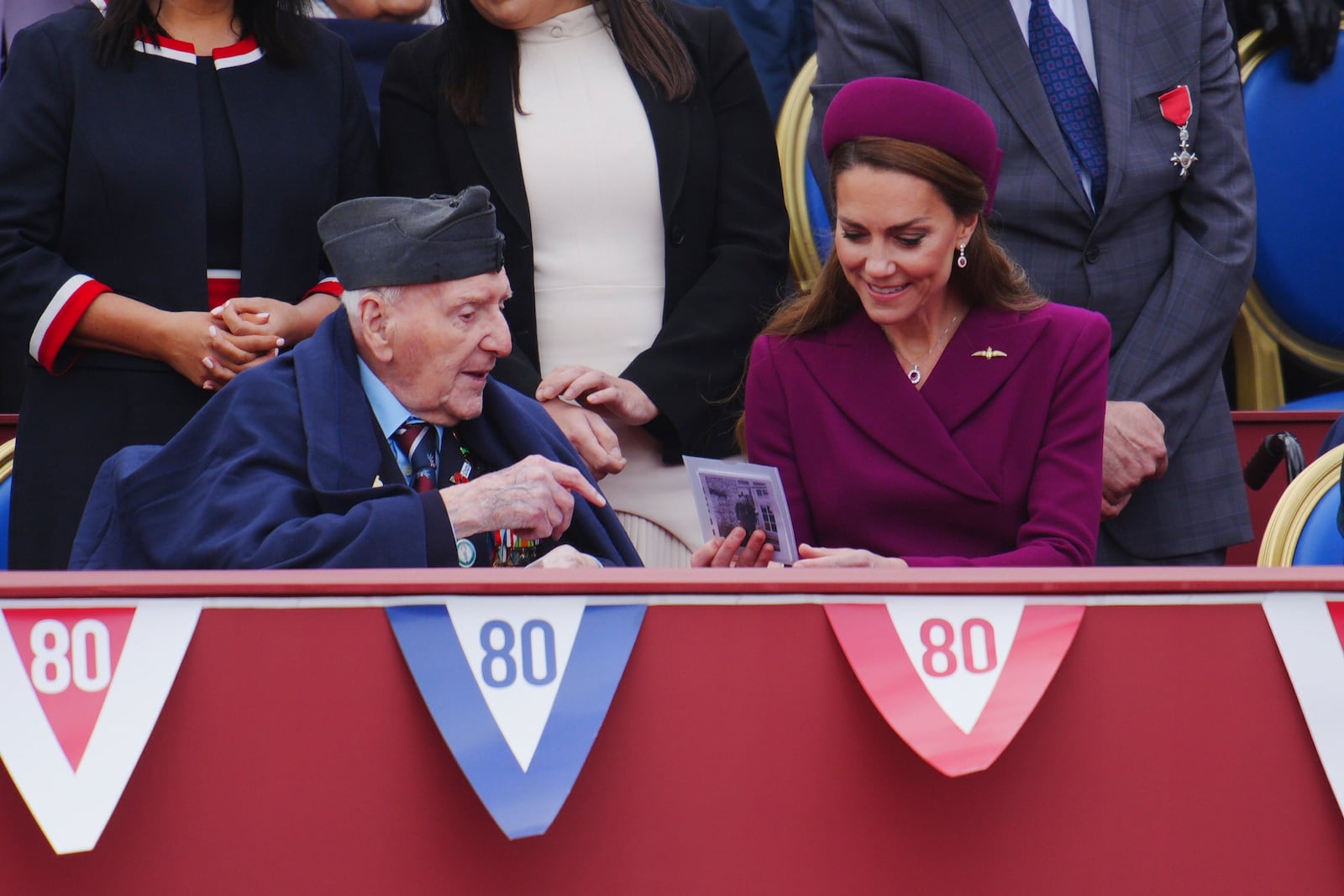 Britain's Kate, Princess of Wales speaks to veteran Bernard Morgan during the military procession marking the 80th anniversary of VE Day, in London, Monday, May 5, 2025. (Ben Birchall/Pool Photo via AP)