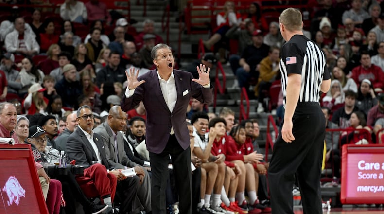 Arkansas coach John Calipari argues a call with the official during an NCAA college basketball game against James Madison Monday, Dec. 29, 2025, in Fayetteville, Ark. (AP Photo/Michael Woods)