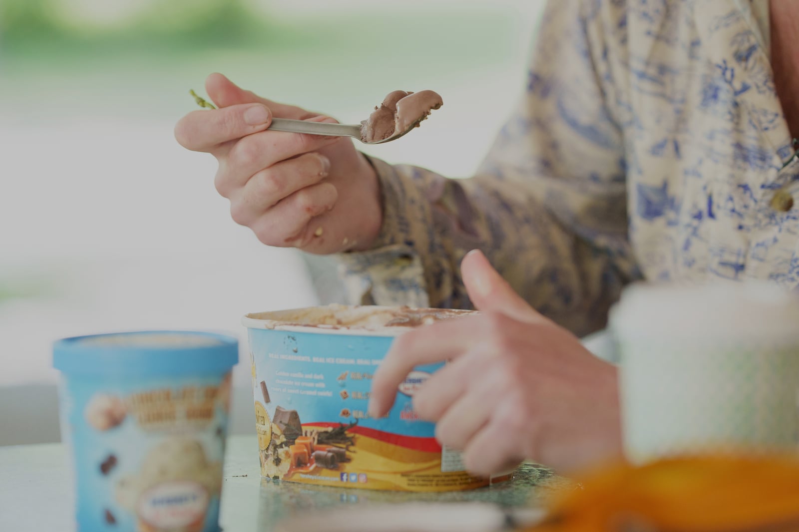 Appalachian Trail thru-hiker Sam Cooper, trail name Pie Top, attempts the half-gallon ice cream challenge at Pine Grove Furnace State Park in Pennsylvania on Tuesday, June 10, 2025. (AP Photo/Mingson Lau)