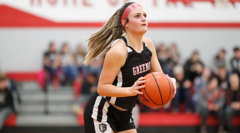 Greenon High School sophomore Avery Minteer prepares to shoot the basketball during their game against Southeastern on Tuesday night in South Charleston. The Knights won 47-34. CONTRIBUTED PHOTO BY MICHAEL COOPER