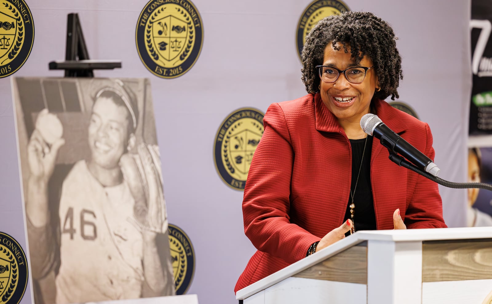 Deena Chisolm speaks during a ceremony unveiling a historical marker for Brooks Lawrence on Friday, Nov. 14 at The Dome on South Limestone Street. Chisolm is the granddaughter of Lawrence, a Springfield native, who broke the color barrier on Miami University's baseball team and for a St. Louis AAA minor league team. He later was a star pitcher with the Reds. BRYANT BILLING/STAFF