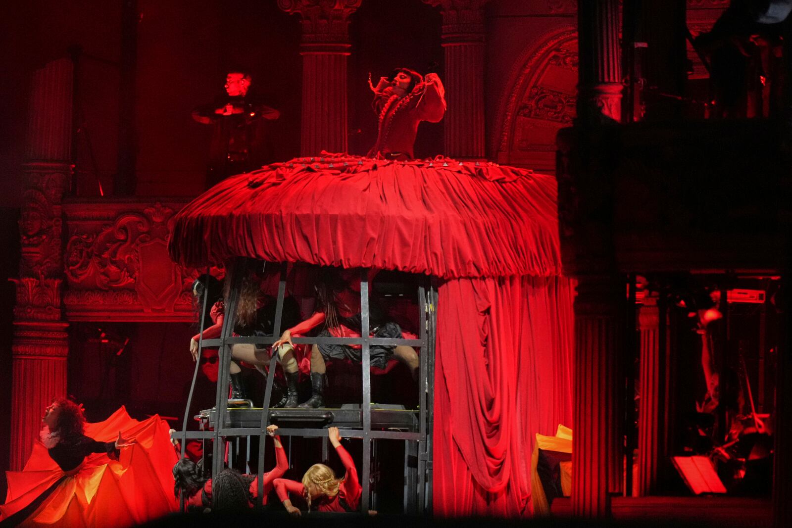 Lady Gaga, top center, performs during her free concert on Copacabana Beach in Rio de Janeiro, Saturday, May 3, 2025. (AP Photo/Silvia Izquierdo)