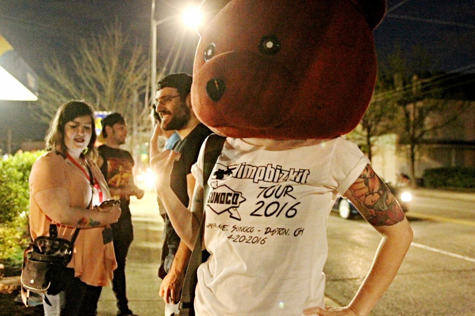 More than 100 people, including this costumed fan, turned out for a fake Limp Bizkit concert at a Sunoco gas station in Dayton on Wednesday night, April 20, 2016. (Jim Noelker/Staff)