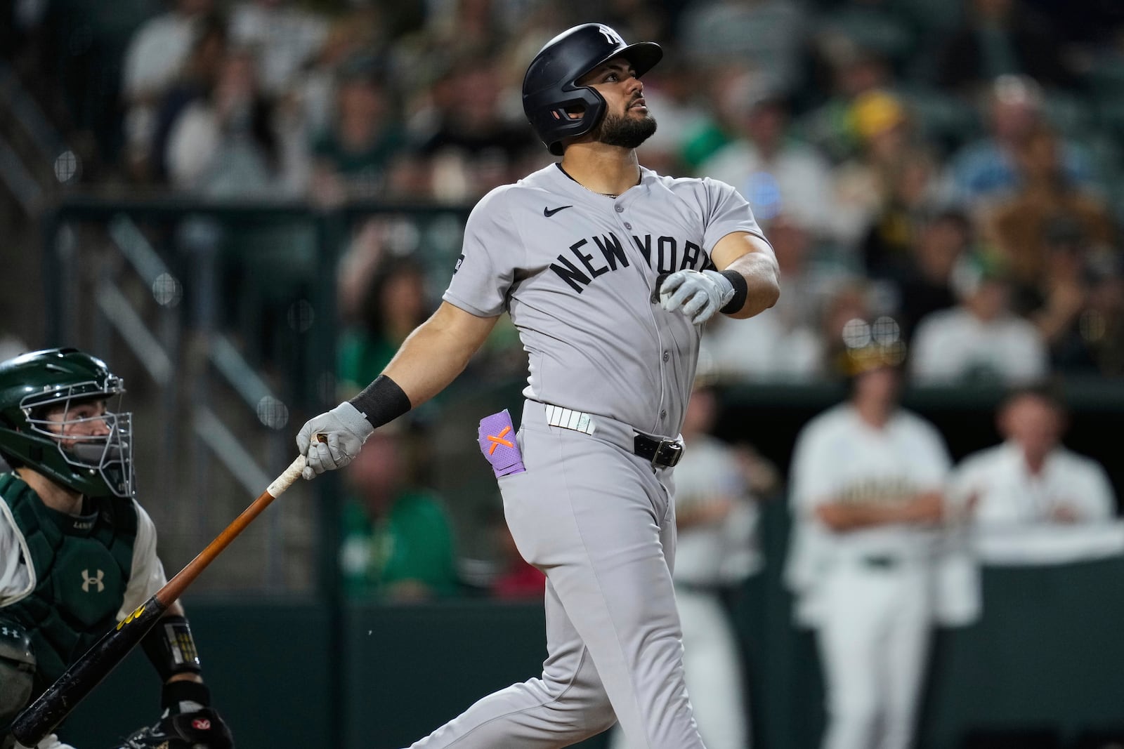 New York Yankees' Jasson Domínguez watches his grand slam during the eighth inning of a baseball game against the Athletics, Friday, May 9, 2025, in West Sacramento, Calif. (AP Photo/Godofredo A. Vásquez)