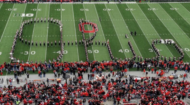 COLUMBUS, OH - NOVEMBER 24: The Ohio State Marching Band performs the Script Ohio before the game against the Michigan Wolverines at Ohio Stadium on November 24, 2012 in Columbus, Ohio. (Photo by Jamie Sabau/Getty Images)