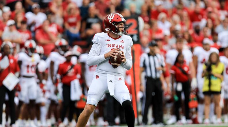 Indiana quarterback Connor Bazelak drops back to pass during the first half of an NCAA college football game against Cincinnati, Saturday, Sept. 24, 2022, in Cincinnati. (AP Photo/Aaron Doster)