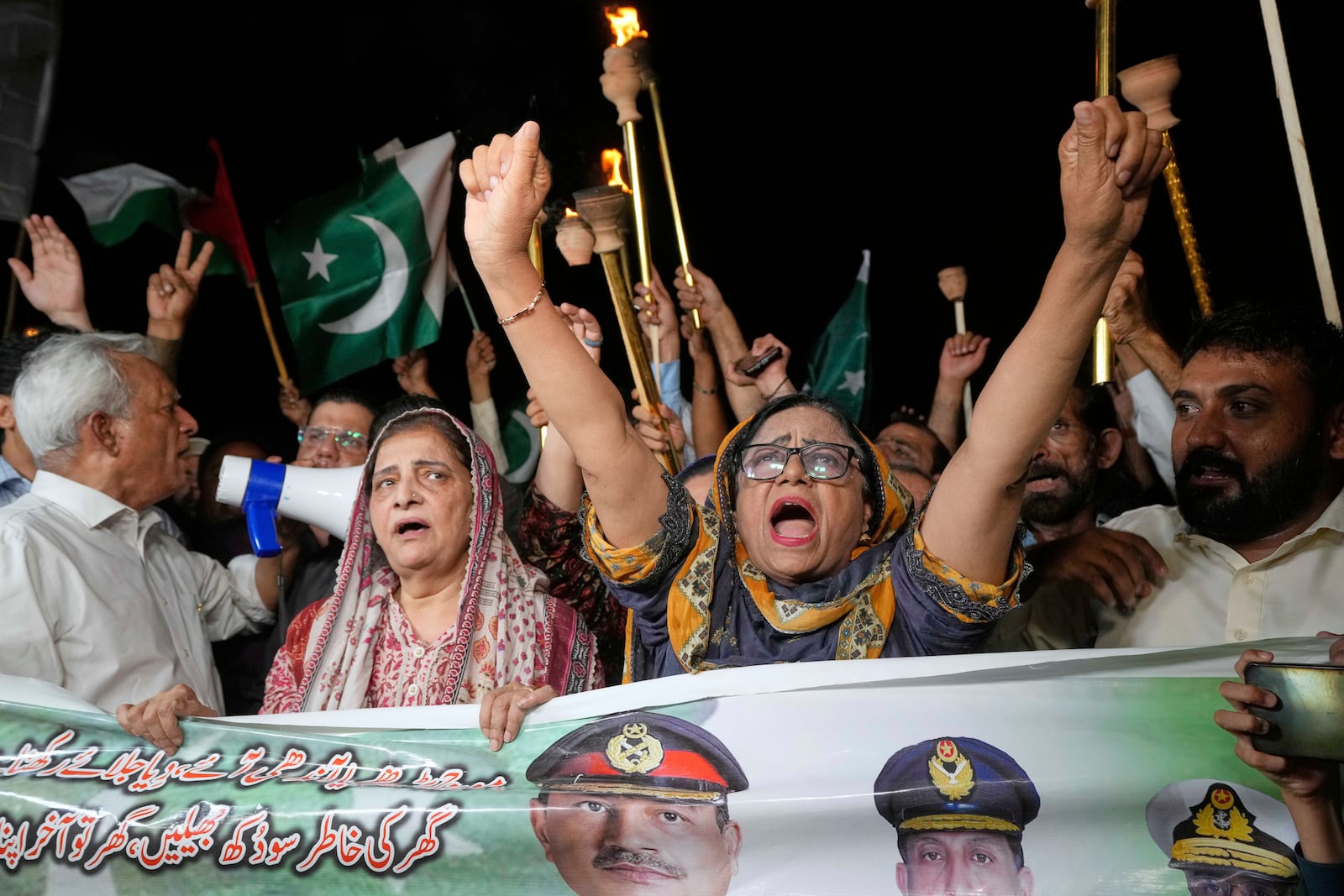 People celebrate Pakistan and India reaching a ceasefire deal, during a demonstration in Karachi, Pakistan, Saturday, May 10, 2025. (AP Photo/Fareed Khan)