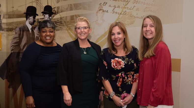 Clark State provost Tiffany Hunter, Wright State president Sue Edwards, Clark State president Jo Blondin and Gracie Northington, a student who went through the Wright Path partnership between Clark State and Wright State, at the ceremony to renew Clark State and Wright State’s partnership. CONTRIBUTED BY WRIGHT STATE