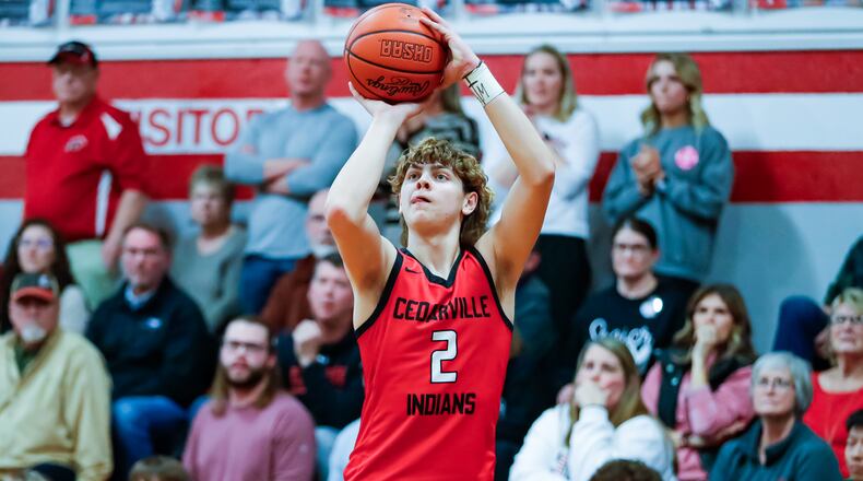 Cedarville High School senior Brayden Criswell shoots a jump shot during their game at Southeastern earlier this season. Michael Cooper/CONTRIBUTED