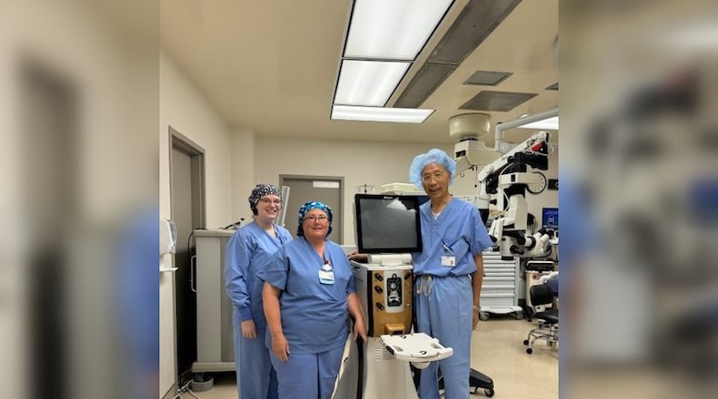 (From left to right) Kelsey Rodman, Surgical RN; Kim Martin, surgical tech; Dr. Gary Lau, ophthalmologist, pose with Phaco equipment, which allows the hospital to perform cataract surgeries. CONTRIBUTED