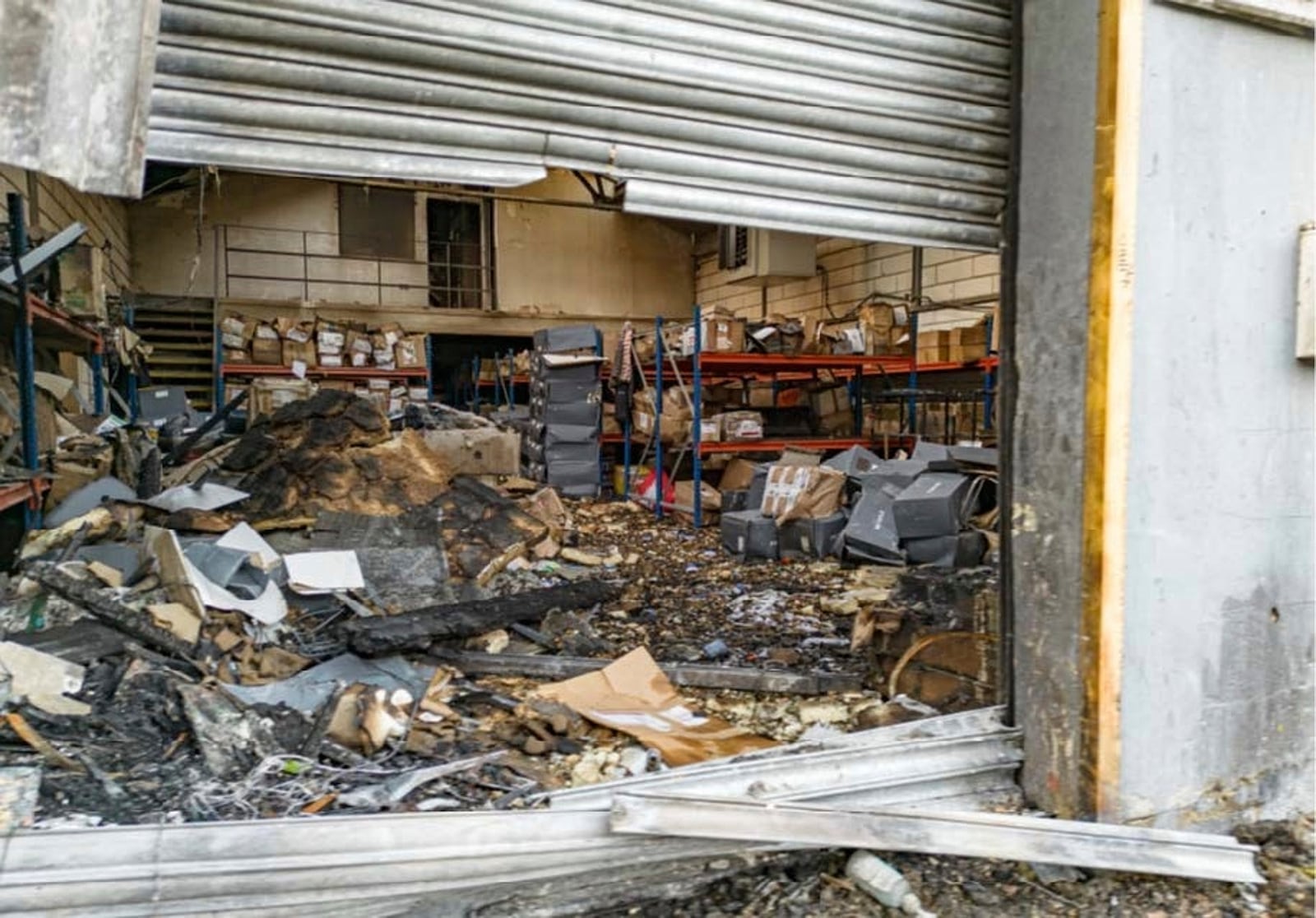 This undated handout photo taken in 2024 and provided by the London Metropolitan Police on Monday, June 9, 2025, shows damage to a warehouse in east London which was storing goods for Ukraine, after a fire which prosecutors said was organized on behalf of Russia's intelligence services. (London Metropolitan Police via AP)