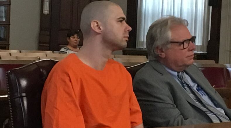 Inmate Casey Pigge appears in Pickaway County Common Pleas Court with his defense attorney Steve Larson. Pigge pleaded guilty to murdering a fellow inmate on a prison bus on Feb. 1, 2017. STAFF/LAURA BISCHOFF