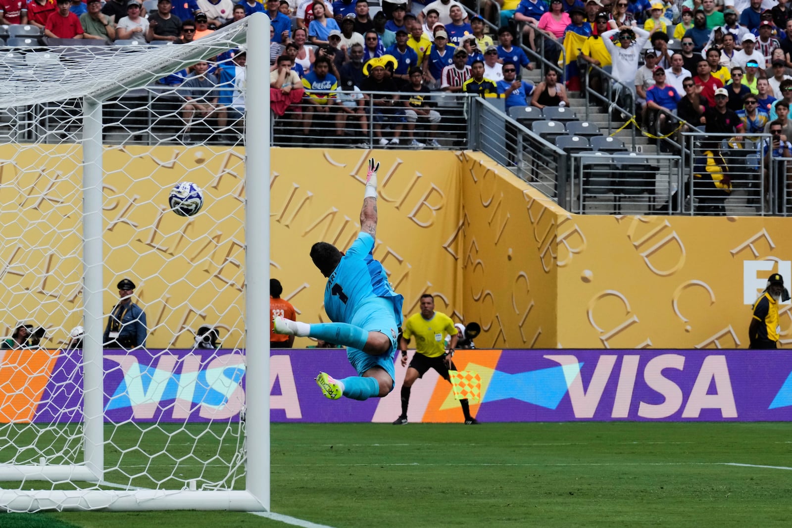 Fluminense goalkeeper Fabio (1) can't stop a goal by Chelsea's João Pedro during the Club World Cup semifinal soccer match between Fluminense and Chelsea in East Rutherford, N.J., Tuesday, July 8, 2025. (AP Photo/Seth Wenig)