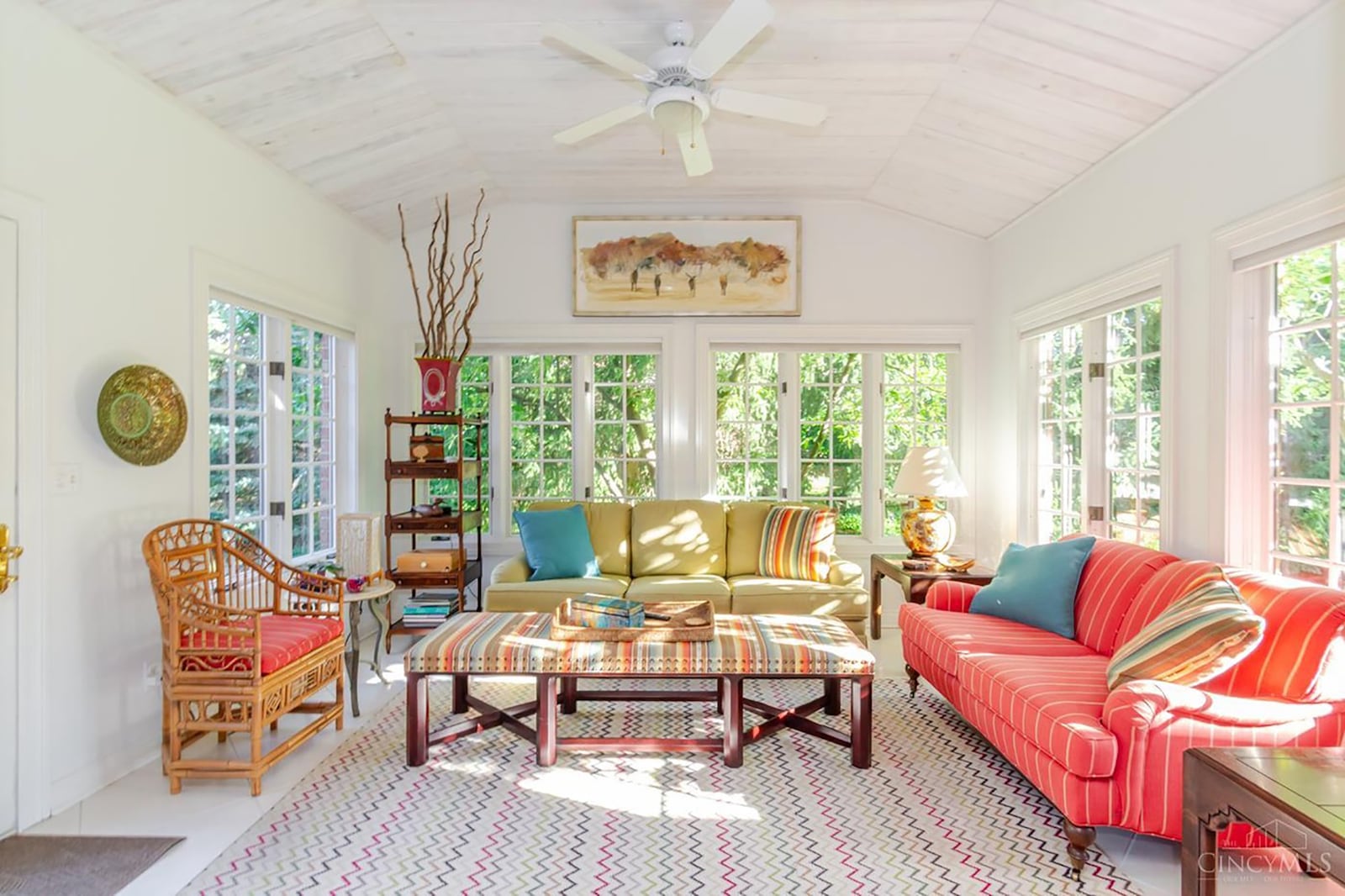 The Florida room has tile flooring, a vaulted ceiling, ceiling fan and exterior door opening to the deck. CONTRIBUTED