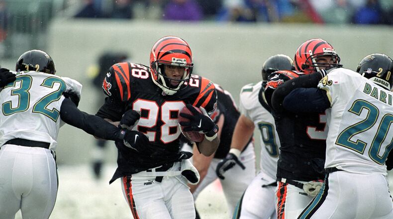 17 Dec 2000: Corey Dillon #28 of the Cincinnati Bengals moves with the ball during the game against the Jacksonville Jaguars at the Paul Brown Stadium in Cincinnati, Ohio. The Bengals defeated the Jaguars 17-14.Mandatory Credit: Jonathan Daniel /Allsport