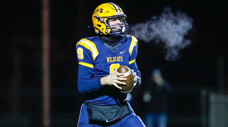 Springfield quarterback Bryce Schondelmyer looks for a receiver during a 35-7 win over Olentangy Liberty on Friday, Nov. 18, 2022. Michael Cooper/CONTRIBUTED