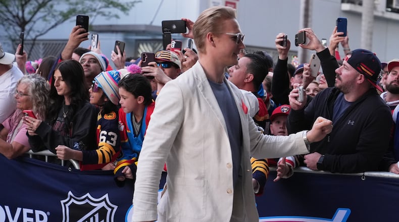 Florida Panthers defenseman Gustav Forsling arrives for the NHL Winter Classic outdoor hockey game between the Florida Panthers and the New York Rangers, Friday, Jan. 2, 2026, in Miami. (AP Photo/Lynne Sladky)