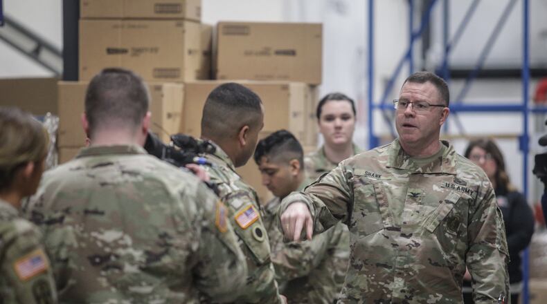 Col. Daniel Shank, Ohio assistant adjutant general for Army, visited Soldiers of the Ohio Army National Guard Friday, March 27, 2020, who are assisting The Foodbank Inc. JIM NOELKER/STAFF