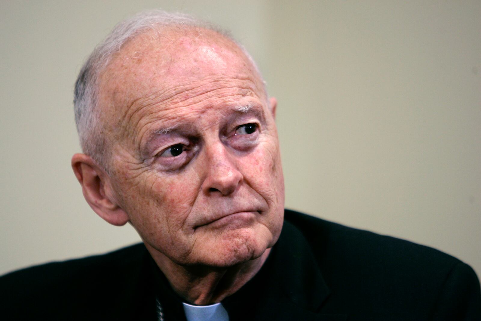 FILE - Former Washington Archbishop, Cardinal Theodore McCarrick listens during a press conference in Washington, May 16, 2006. (AP Photo/J. Scott Applewhite, File)