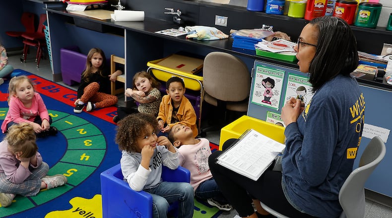 Students in Clark and Champaign County school districts will soon start the 2023-24 school year. Here, Stephanie Jones, a teacher in the Springfield City Schools District, teaches a pre-school class at Clark School earlier this year. FILE/BILL LACKEY/STAFF