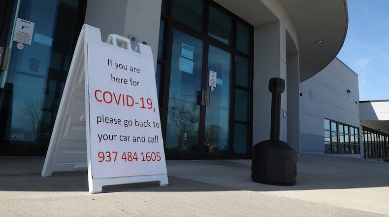 A sign outside the Champaign County Government Center Thursday. BILL LACKEY/STAFF