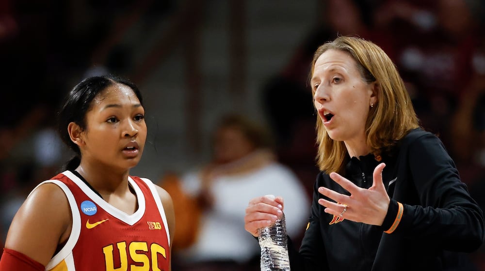 Southern California head coach Lindsay Gottlieb, right, talks to guard Malia Samuels (10) during the second half against Clemson in the first round of the NCAA college basketball tournament, Saturday, March 21, 2026, in Columbia, S.C. (AP Photo/Nell Redmond)