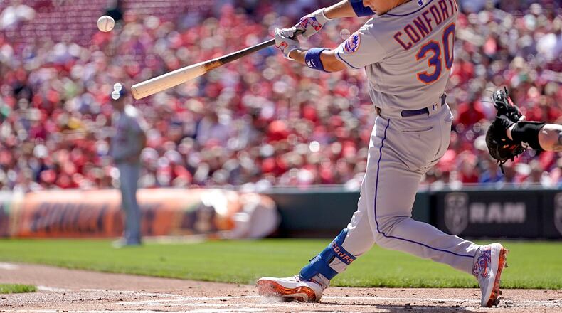 CINCINNATI, OHIO - SEPTEMBER 22: Michael Conforto #30 of the New York Mets hits a 3-run home run during the game against the Cincinnati Reds at Great American Ball Park on September 22, 2019 in Cincinnati, Ohio. (Photo by Bryan Woolston/Getty Images)