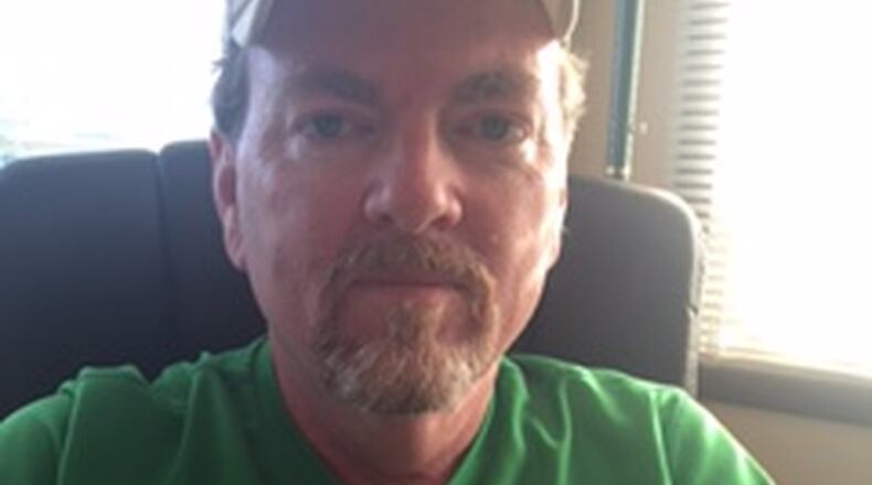 Catholic Central track coach Mike McKenna