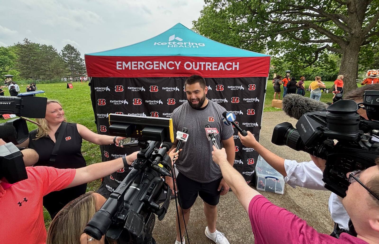 Bengals third-round pick Dylan Fairchild talks to reporters at an NFL Flag In-School event at the Dayton Early College Academy PREP on Friday, May 16, 2025, in Dayton. David Jablonski/Staff