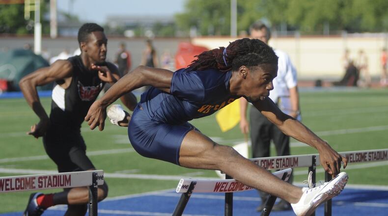 Springfield junior Dyier Smith won the 110-meter high hurdles during the D-I regional track and field meet at Dayton’s Welcome Stadium on Friday, May 26, 2017. MARC PENDLETON / STAFF