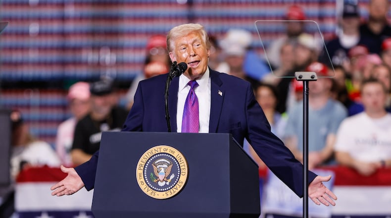President Donald Trump addresses a crowd at a rally Wednesday, March 11, 2026 at Verst Logistics in Hebron, Kentucky. NICK GRAHAM/STAFF
