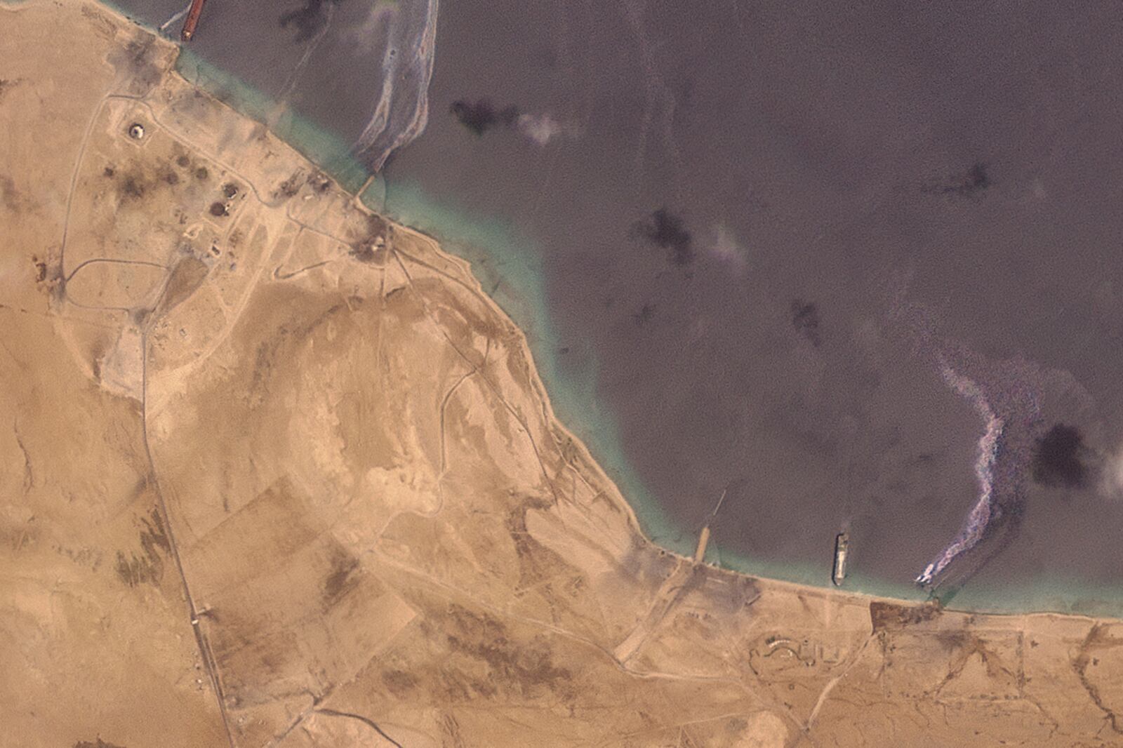 This satellite image from Planet Labs PBC shows the aftermath of U.S. airstrikes targeting the Ras Isa oil port in Yemen on Friday, April 18, 2025. (Planet Labs PBC via AP)