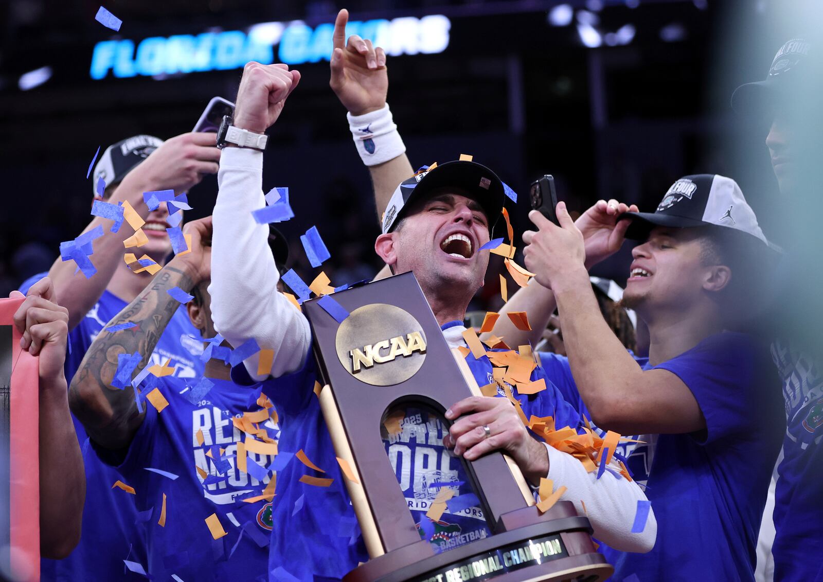 Florida head coach Todd Golden celebrates following his team's win over Texas Tech in the Elite Eight of the NCAA college basketball tournament, Saturday, March 29, 2025, in San Francisco. (Scott Strazzante/San Francisco Chronicle via AP)