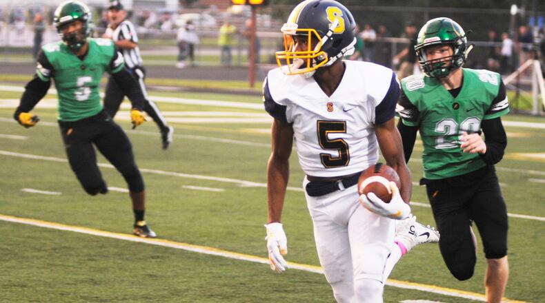 Larry Stephens of Springfield (5) is chased by Northmont’s Andrew Knick. Springfield lost 25-7 at Northmont in a Week 7 high school football game on Friday, Oct. 5, 2018. MARC PENDLETON / STAFF