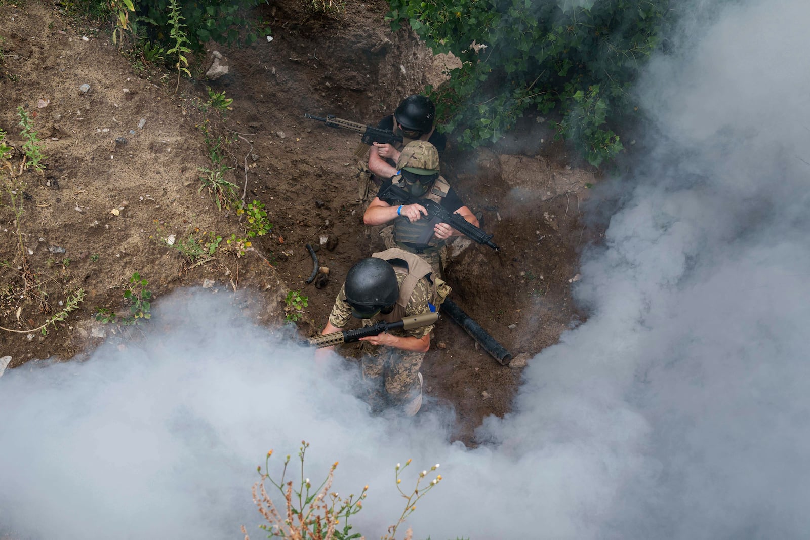 Ukrainian 3rd Assault Brigade recruits train at the polygon in Kyiv region, Ukraine, on Wednesday, July 16, 2025. (AP Photo/Evgeniy Maloletka)