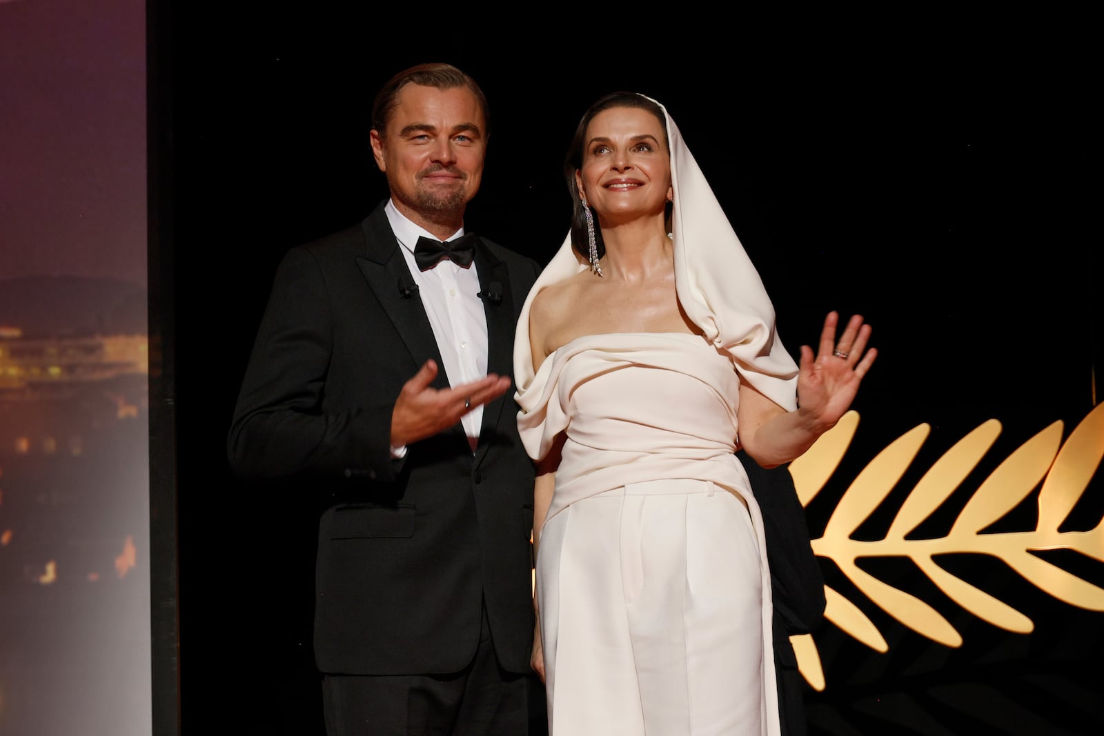 Leonardo DiCaprio, left, and jury president Juliette Binoche pose for photographers during the opening ceremony of the 78th international film festival, Cannes, southern France, Tuesday, May 13, 2025. (Photo by Joel C Ryan/Invision/AP)