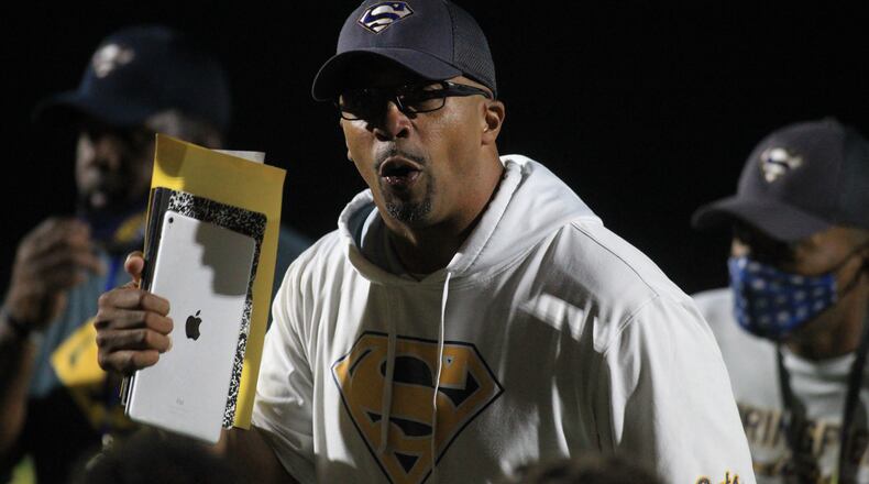 Springfield's Chris Wallace talks to the team after a victory against Centerville on Friday, Oct. 8, 2021, at Springfield. David Jablonski/Staff