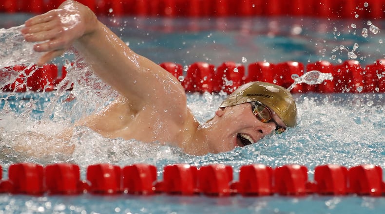 Kenton Ridge High School sophomore Evan Blazer swims during the Clark County Invitational at the Springfield Family YMCA in Springfield in 2021. SNS FILE PHOTO