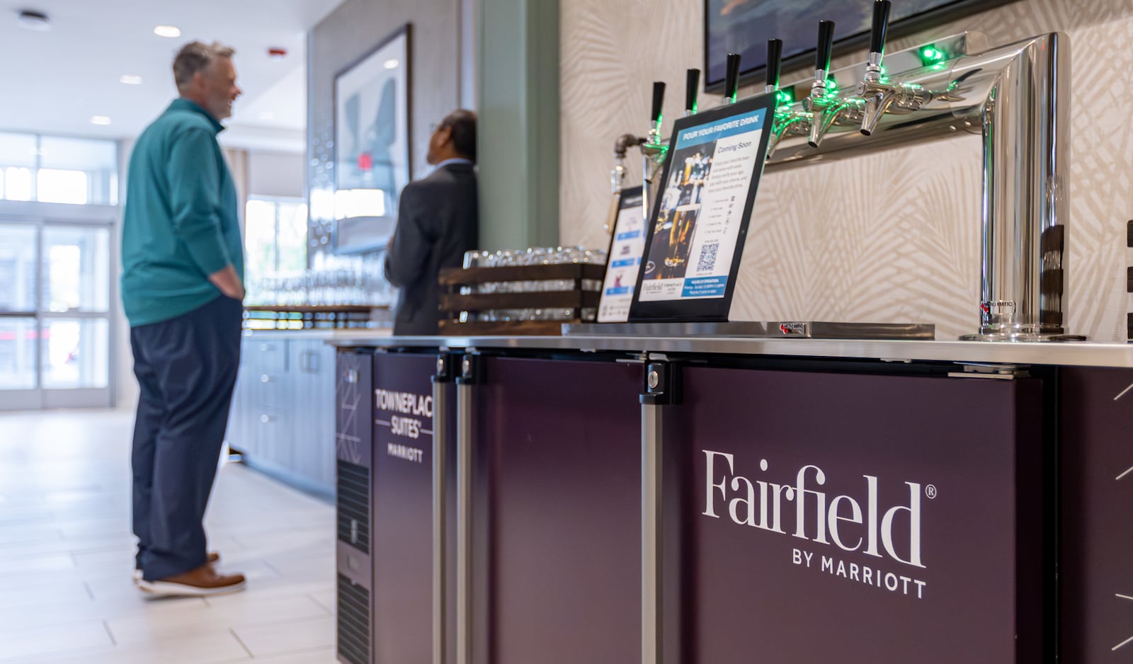 A view of a self-pour beer tap in the lobby of Fairfield Inn and Suites and TownePlace Suites next to Mall at Fairfield Commons in Beavercreek. The hotel celebrated its opening on Friday, Sept. 5. BRYANT BILLING / STAFF