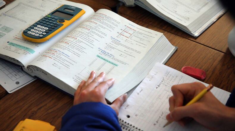 FILE — A student works during math class at George Washington High School in San Francisco, Oct. 27, 2021. .The 2024 National Assessment of Educational Progress showed progress in math, even as reading skills reached new lows. (Jim Wilson/The New York Times)
