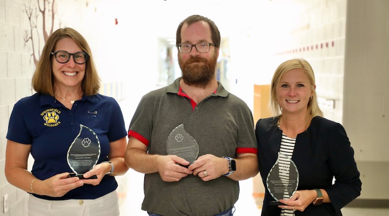 Springfield City School District has named three of its employees as Employees of the Year, including (from left to right) Tricia Blair, Springfield High School English teacher; Fred Waltermier, secretary in the Transportation Department; and Marcie Hobson, a Family Outreach Connections Specialist. Contributed