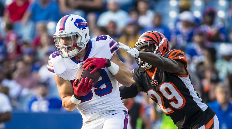 ORCHARD PARK, NY - AUGUST 26: Brandon Reilly #89 of the Buffalo Bills makes a first down reception as Tony McRae #29 of the Cincinnati Bengals defends during the fourth quarter of a preseason game at New Era Field on August 26, 2018 in Orchard Park, New York. Cincinnati defeats Buffalo 26-13 in the preseason matchup. (Photo by Brett Carlsen/Getty Images)
