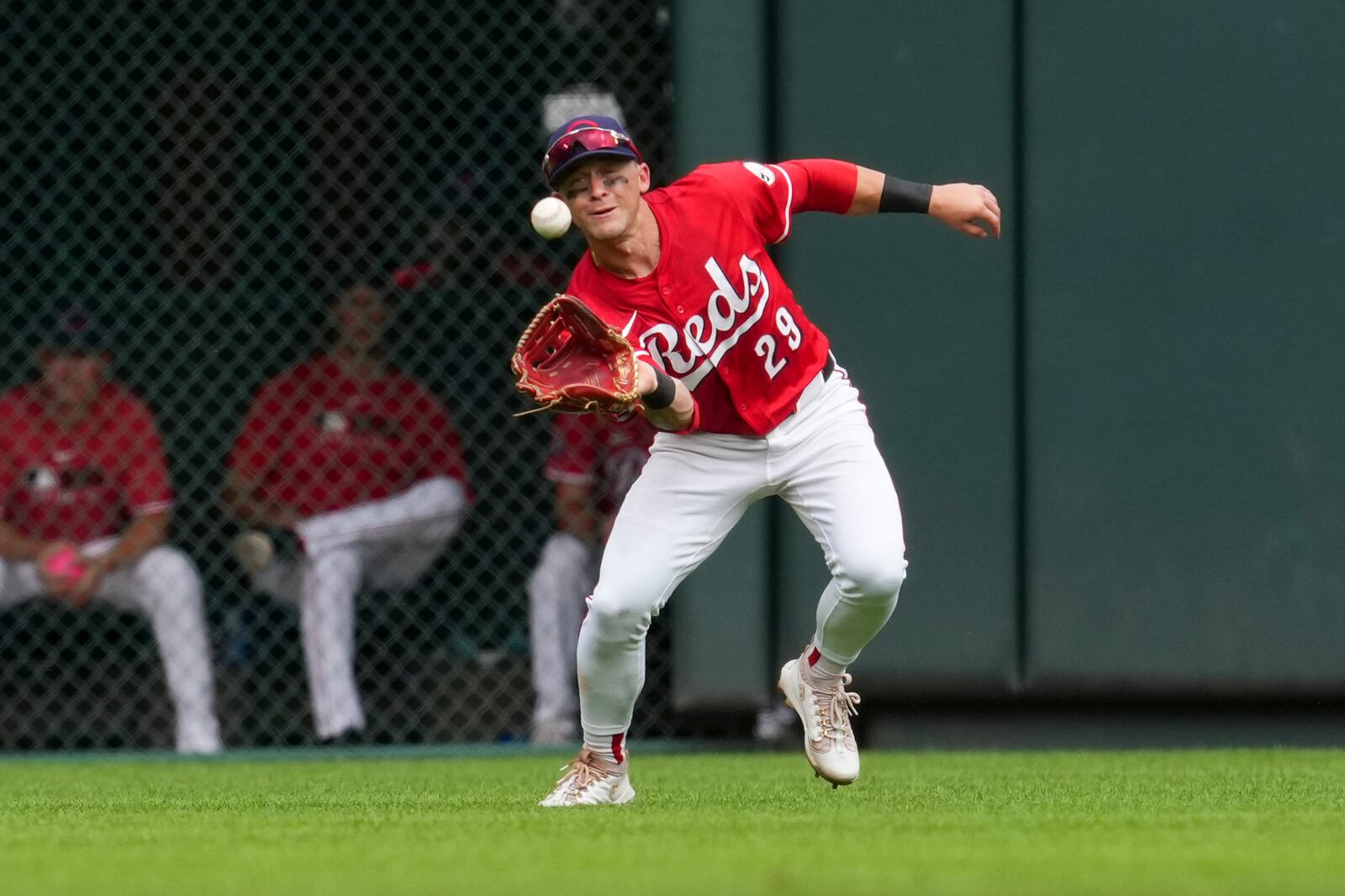 Cincinnati Reds outfielder TJ Friedl catches a line drive hit by Tampa Bay Rays' Chandler Simpson during the seventh inning of a baseball game, Sunday, July 27, 2025, in Cincinnati. (AP Photo/Jeff Dean)
