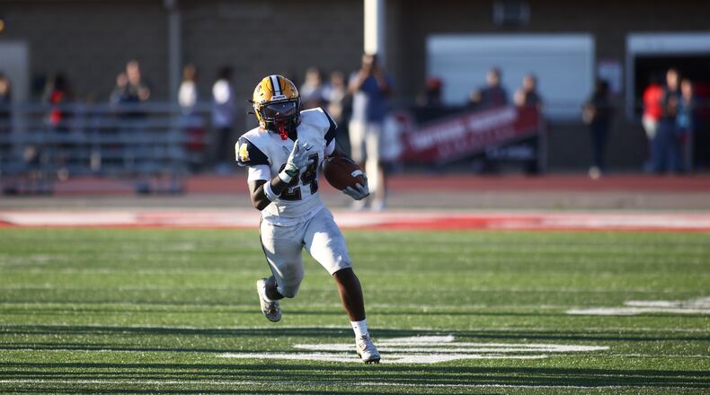 Springfield's Deontre Long runs against Trotwood-Madison on Friday, Sept. 1, 2023, in Trotwood. David Jablonski/Staff
