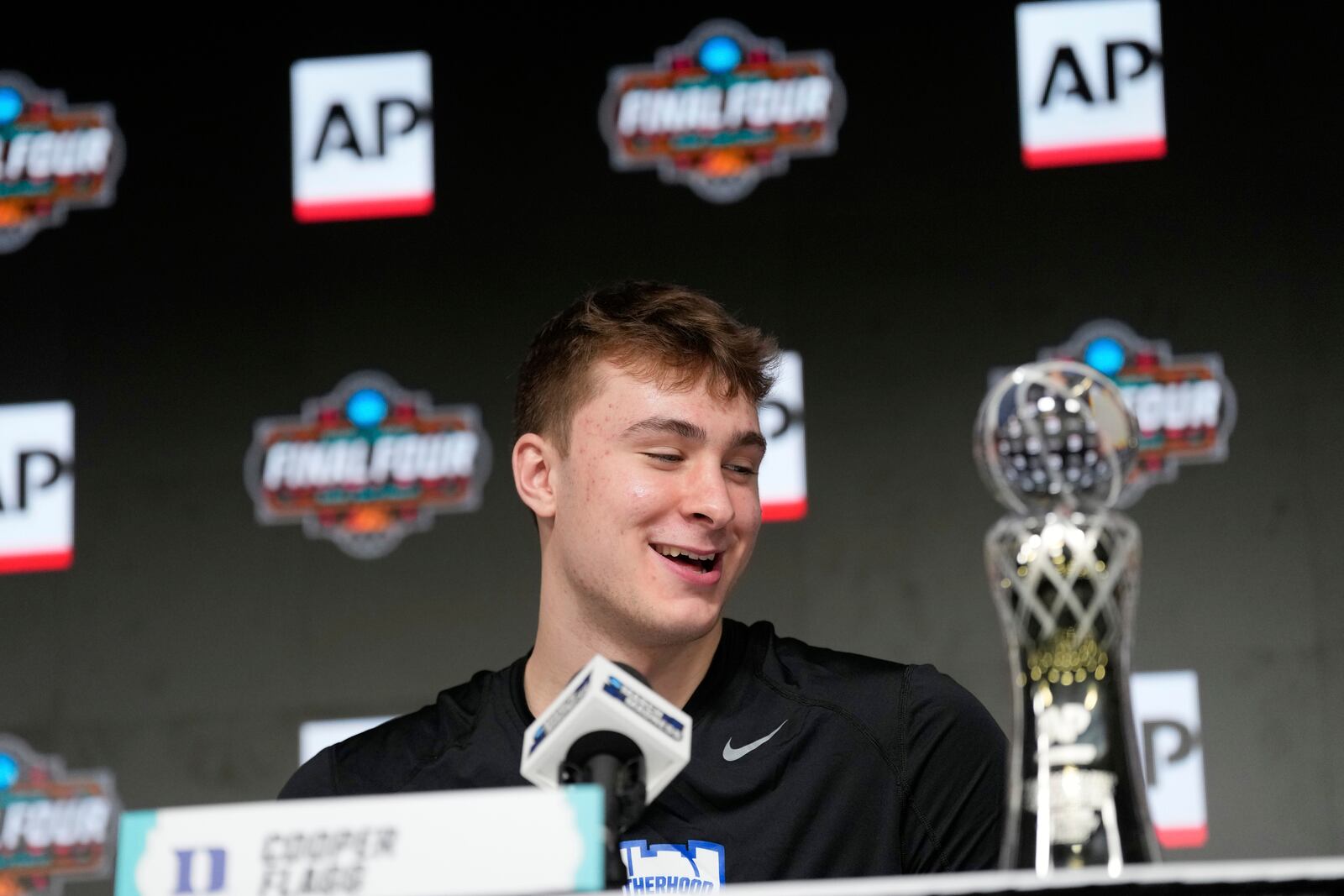 Duke forward Cooper Flagg, Associated Press Player of the Year, smiles during a news conference ahead of the Final Four college basketball games in the NCAA Tournament Friday, April 4, 2025, in San Antonio. (AP Photo/Eric Gay)